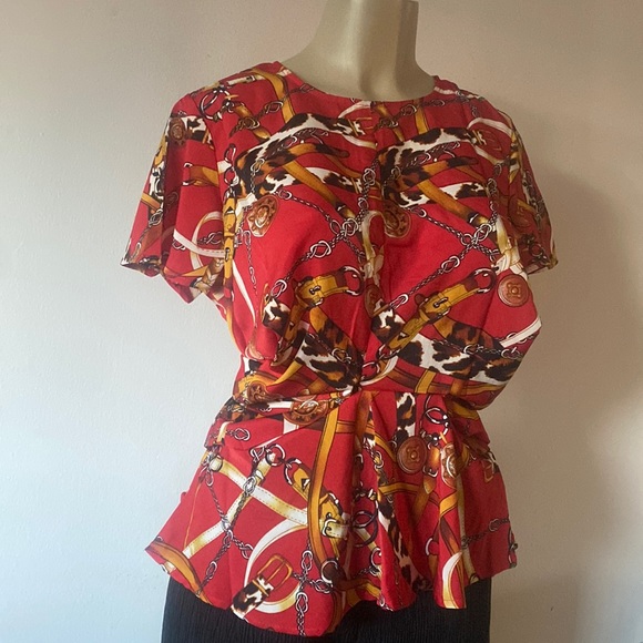 Tops - Red printed blouse. New blouse beautiful.